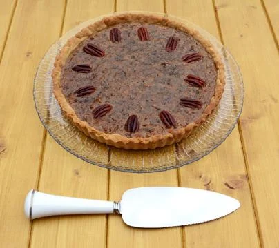 Pie server with pecan pie Stock Photos