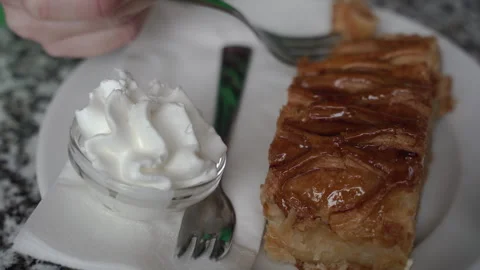 Pie tasting. A man pricks a piece of pie with a fork. Stock Footage 306175542