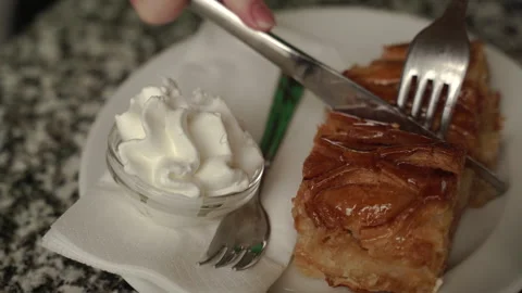 Pie tasting. A man pricks a piece of pie with a fork. Stock Footage 306180292