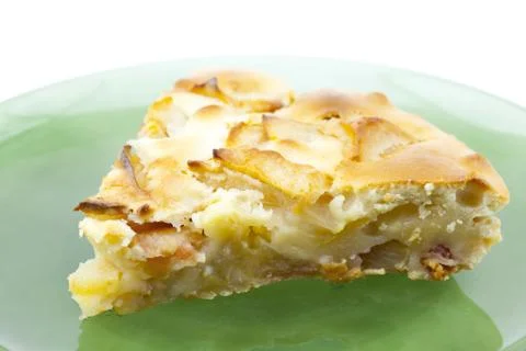 Piece of apple pie is isolated on white Stock Photos