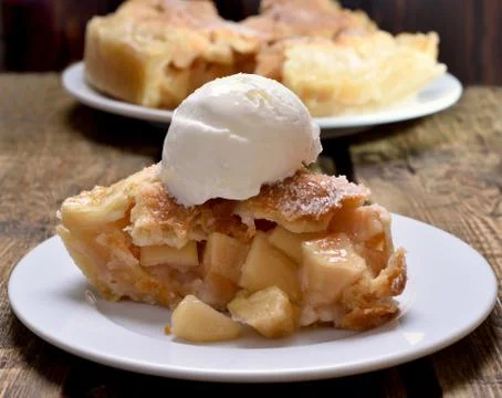 Piece of apple pie Stock Photos