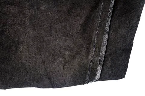 Piece of black leather, back side Stock Photos