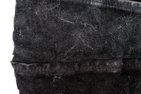 Piece of black leather, back side Stock Photos