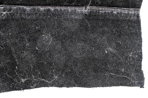 Piece of black leather, back side Stock Photos