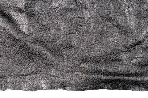 Piece of black leather Stock Photos