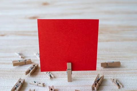 Piece Of Blank Square Note Surrounded By Laundry Clips Showing New Meaning... Stock Photos