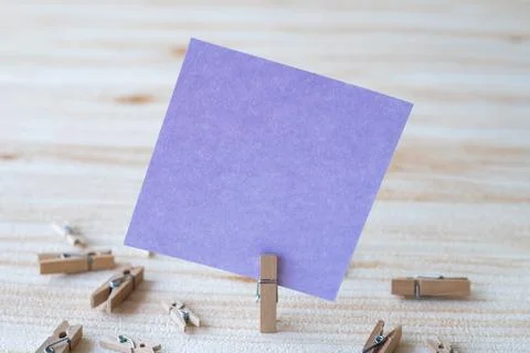 Piece Of Blank Square Note Surrounded By Laundry Clips Showing New Meaning... Stock Photos