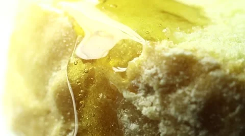 A piece of bread and honey Stock Footage 58788568