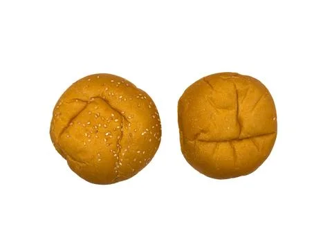 A piece of bread with a brown crust, burger buns, freshly baked buns for Stock Photos