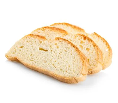 A piece of bread close-up isolated on a white background. Stock Photos