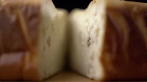 Piece of bread divided into two parts Stock Footage 64544548