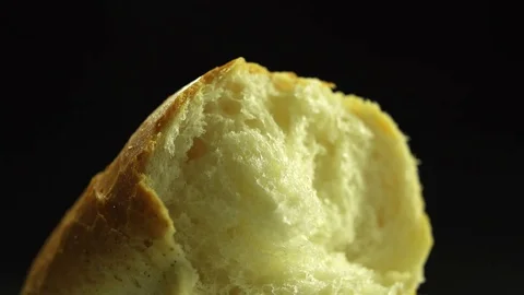 Piece of bread with flowing down honey slow motion Stock Footage 83037564