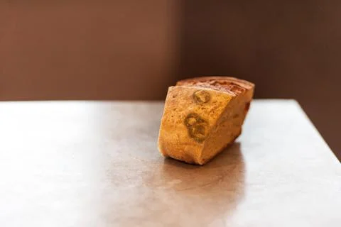 A piece of bread with mold Stock Photos