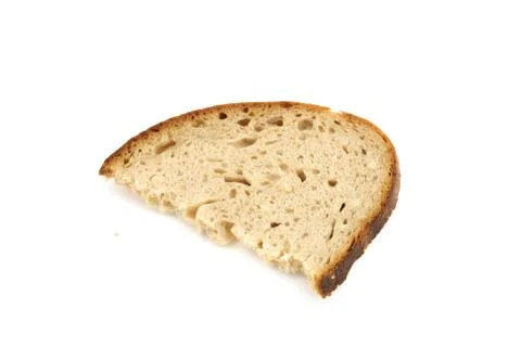 Piece of bread on white background Stock Photos