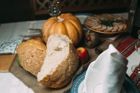 A piece of broken bread on the table Stock Photos