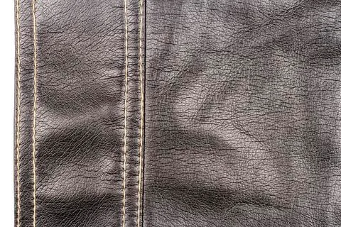 Piece of brown leather Stock Photos