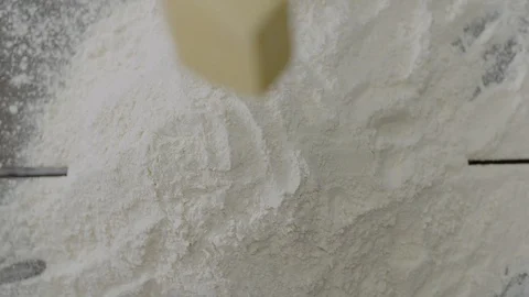 Piece of Butter is Dropping into The Dough 스톡 동영상 115862739