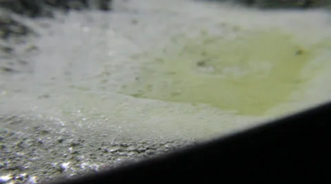 The piece of butter thaws pan Stock Footage 25719601