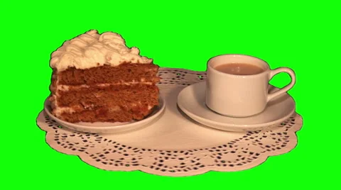 Piece of cake and cup of white coffee on saucer Stock Footage 48442497