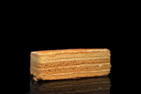 Piece of cake on black background Stock Photos