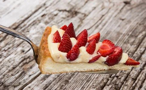 Piece of cake on a cake lifter Stock Photos