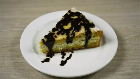 A piece of cake that is eaten bit by bit. Stop motion Stock Footage 245307922