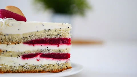 Piece of cake with raspberry Stock Footage 155591068