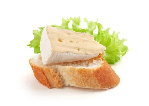 Piece of camembert on the bread Stock-Fotos