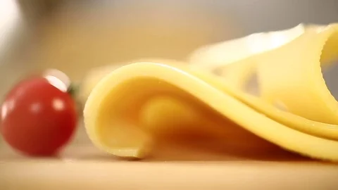 Piece of cheese falls slow motion Stock Footage 85277414