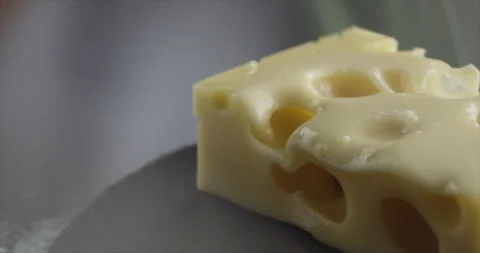 Piece of cheese melts timelapse Stock Footage 200255161