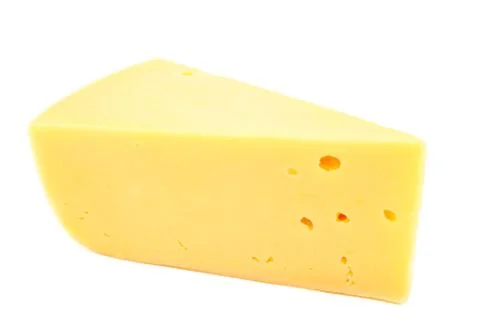 Piece of cheese on a white background. Stock Photos