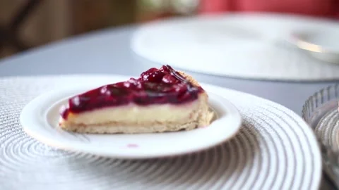 A piece of cherry cheesecake goes to the pie Stock Footage 201306509