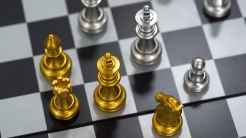 Piece of chess game stand on chessboard Vídeos de archivo 125801939