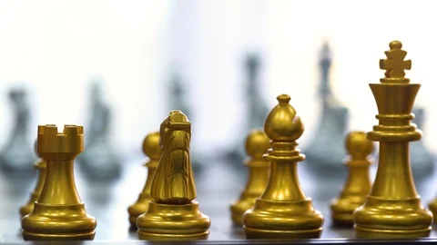 Piece of chess game stand on chessboard Vídeos de archivo 125802847
