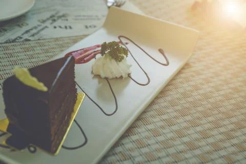 Piece of chocolate brownie cake.(Selective focus) Stock Photos