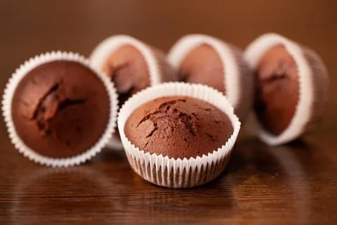 A piece of chocolate cake with mint on the table, close-up Stock Photos