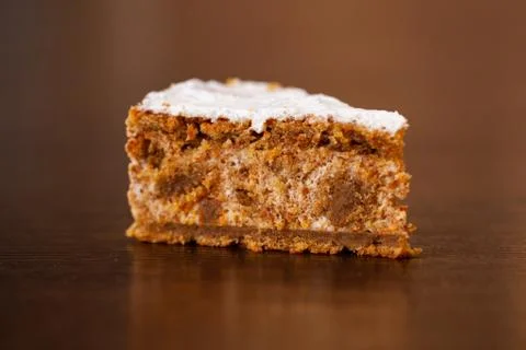 A piece of chocolate cake with mint on the table, close-up Stock Photos