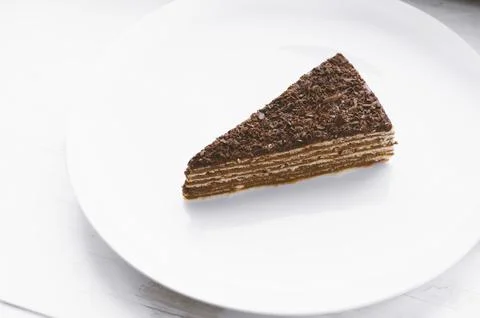 Piece of chocolate cake on a  plate Stock Photos