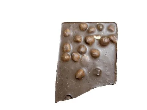 Piece of chocolate with hazelnuts isolated on white 库存照片
