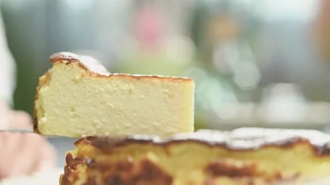 Piece of classic Basque cheesecake. Stock Footage 151688903
