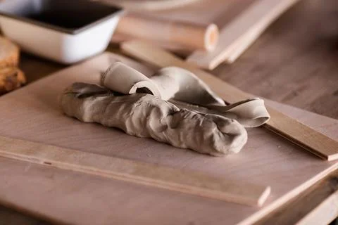 A piece of clay on the table on the workshop Stock Photos