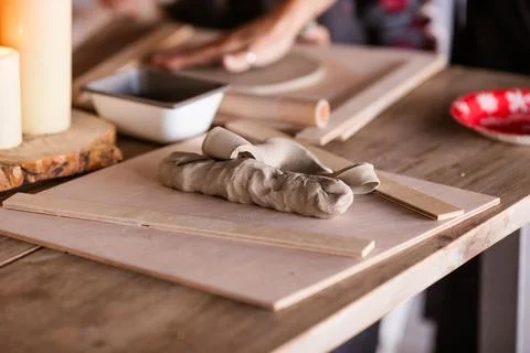 A piece of clay on the table on the workshop Stock Photos