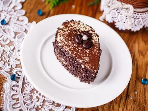 A piece of coffee cake with a white pearl Stock Photos
