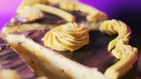 A piece of delicious cake with chocolates Stock Footage 85687860