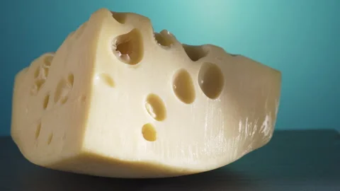 Piece of delicious cheese close-up Stock Footage 134936548
