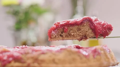 Piece of delicious plum cake. Stock Footage 159401010
