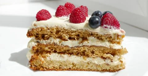 Piece of delicious raspberry cake Stock Photos