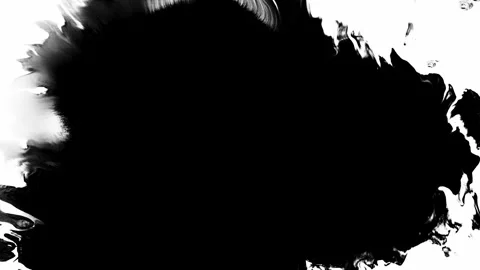 This piece features an abstract black ink blot situated on a stark white Stock Footage 303703225