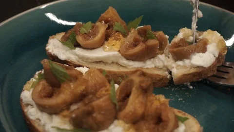 Piece of fig bruschetta Stock Footage 113527587