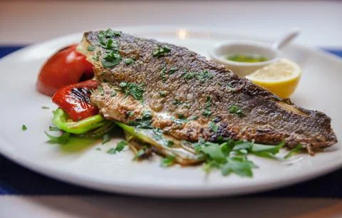 Piece of Fish with Pepper Stock Photos